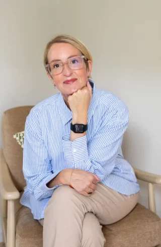 Image of Michelle Jean sitting in counselling room in Ashford, Kent